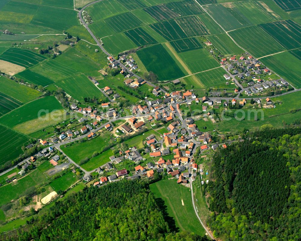 Aerial photograph Udenhausen - Village view on the edge of agricultural fields and land in Udenhausen in the state Hesse, Germany