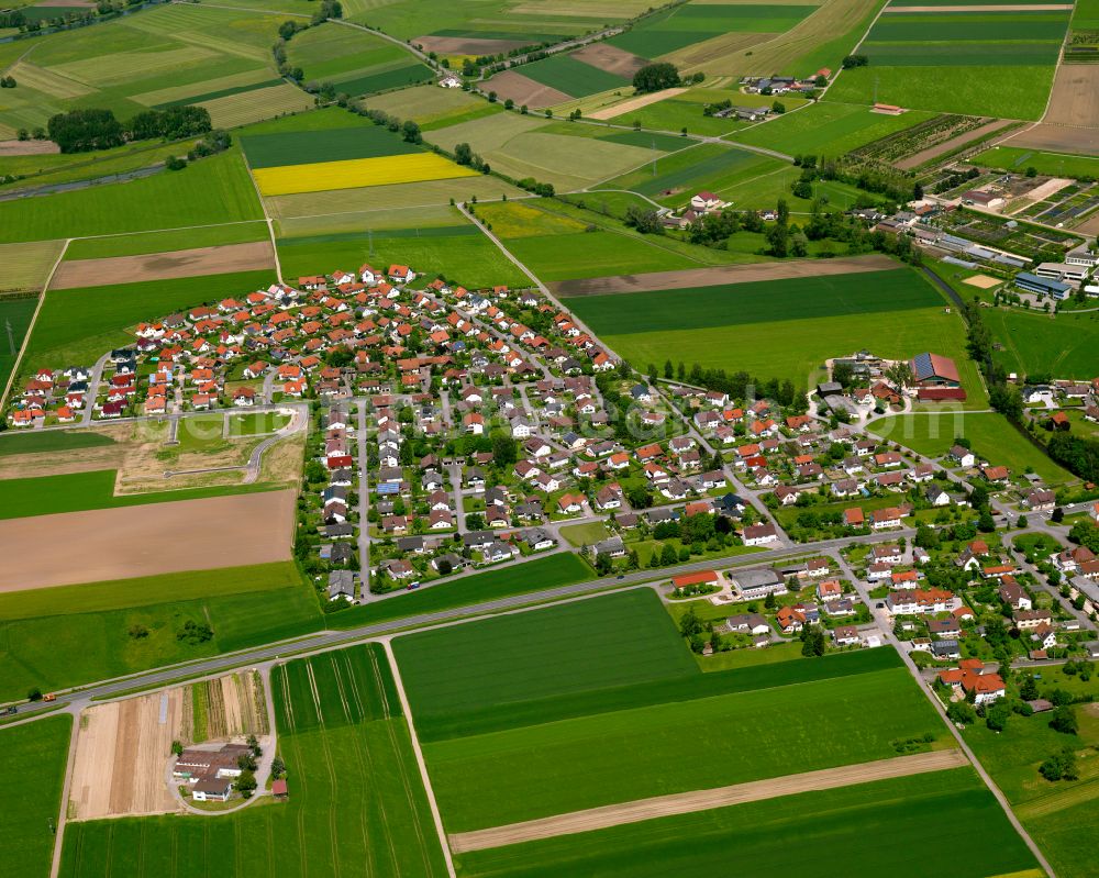 Unlingen from above - Village view on the edge of agricultural fields and land in Unlingen in the state Baden-Wuerttemberg, Germany