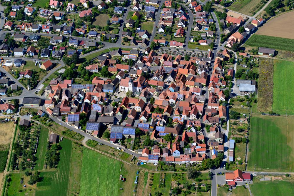 Untereisenheim from the bird's eye view: Village view on the edge of agricultural fields and land in Untereisenheim in the state Bavaria, Germany