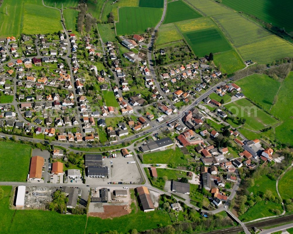 Aerial image Unterhaun - Village view on the edge of agricultural fields and land in Unterhaun in the state Hesse, Germany