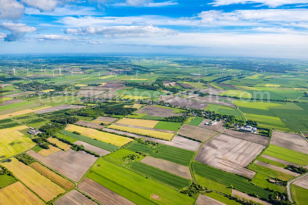 Aerial photograph Uphusum - Village view on the edge of agricultural fields and land in Uphusum in the state Schleswig-Holstein, Germany