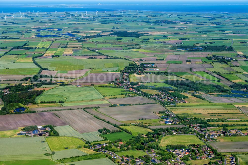 Aerial photograph Uphusum - Village view on the edge of agricultural fields and land in Uphusum in the state Schleswig-Holstein, Germany