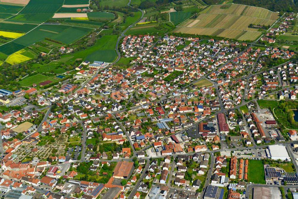 Volkach from above - Village view on the edge of agricultural fields and land in Volkach in the state Bavaria, Germany