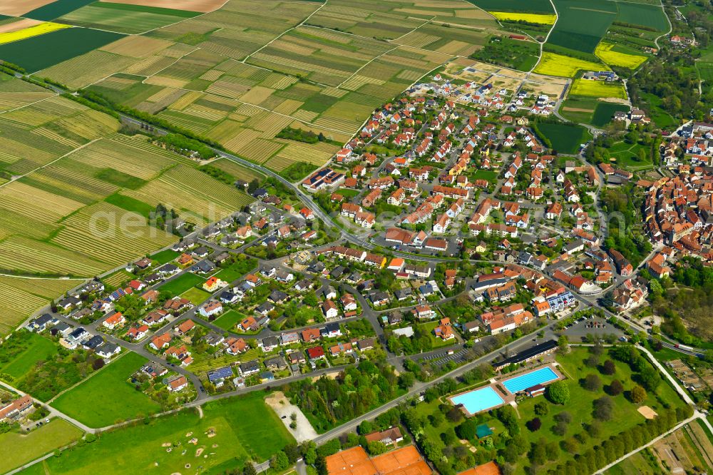 Volkach from the bird's eye view: Village view on the edge of agricultural fields and land in Volkach in the state Bavaria, Germany