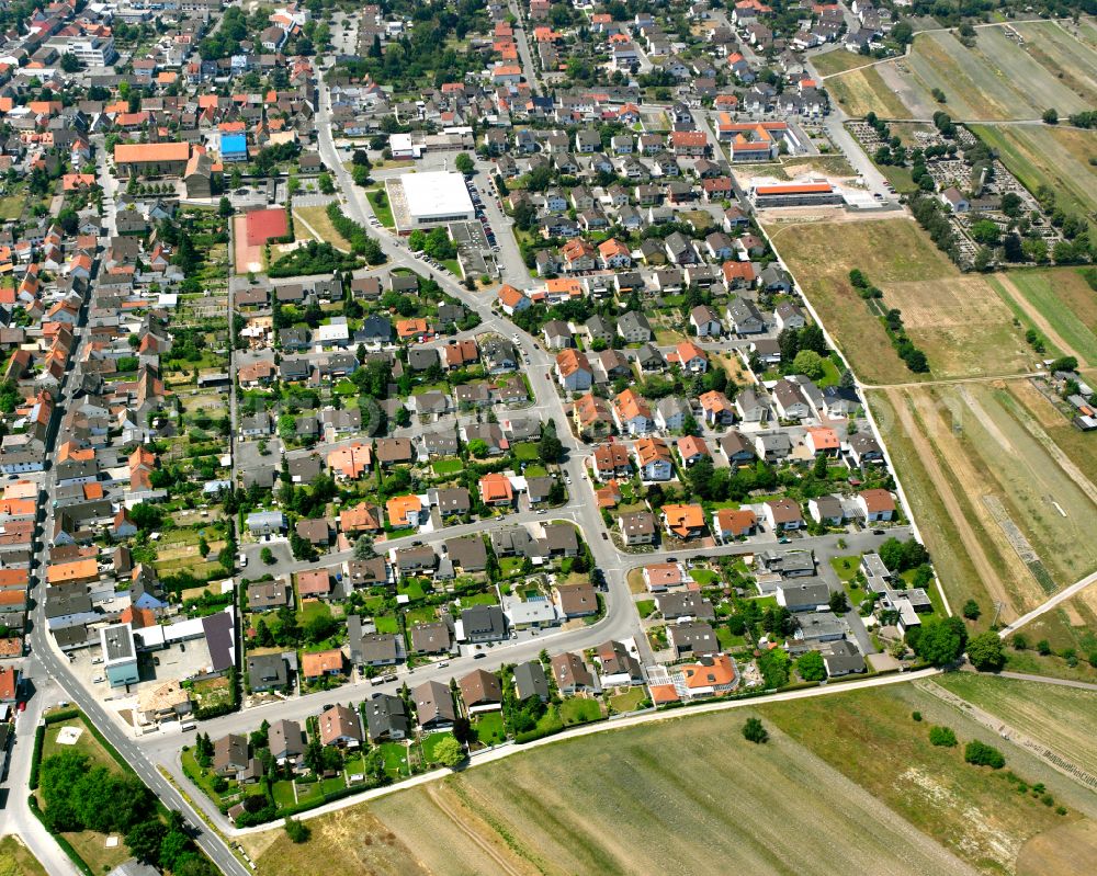 Waghäusel from above - Village view on the edge of agricultural fields and land on street Rheinstrasse in the district Kirrlach in Waghaeusel in the state Baden-Wuerttemberg, Germany