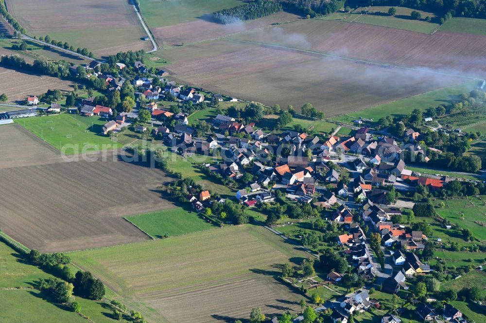 Wangelnstedt from the bird's eye view: Village view on the edge of agricultural fields and land in Wangelnstedt in the state Lower Saxony, Germany