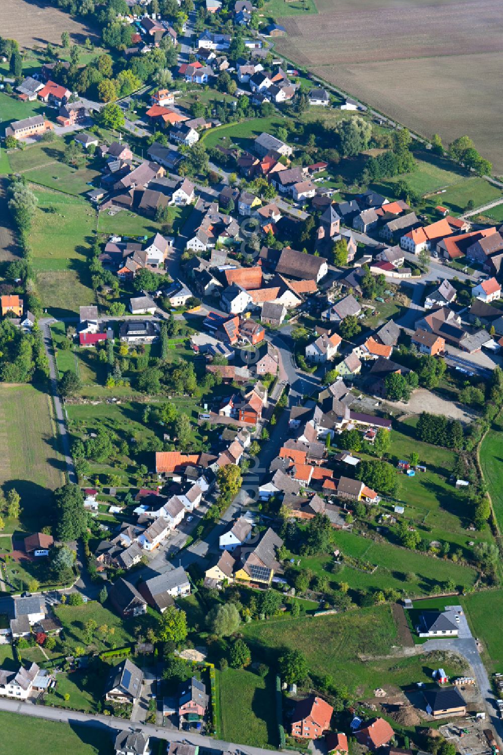 Aerial image Wangelnstedt - Village view on the edge of agricultural fields and land in Wangelnstedt in the state Lower Saxony, Germany