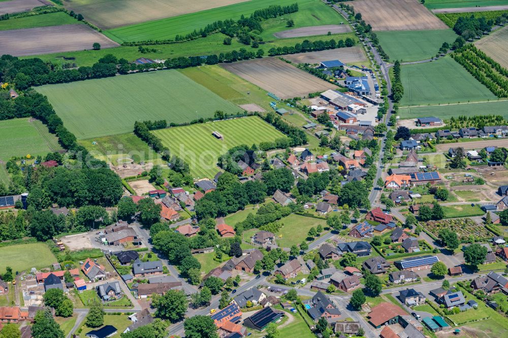 Wangersen from above - Village view on the edge of agricultural fields and land in Wangersen in the state Lower Saxony, Germany