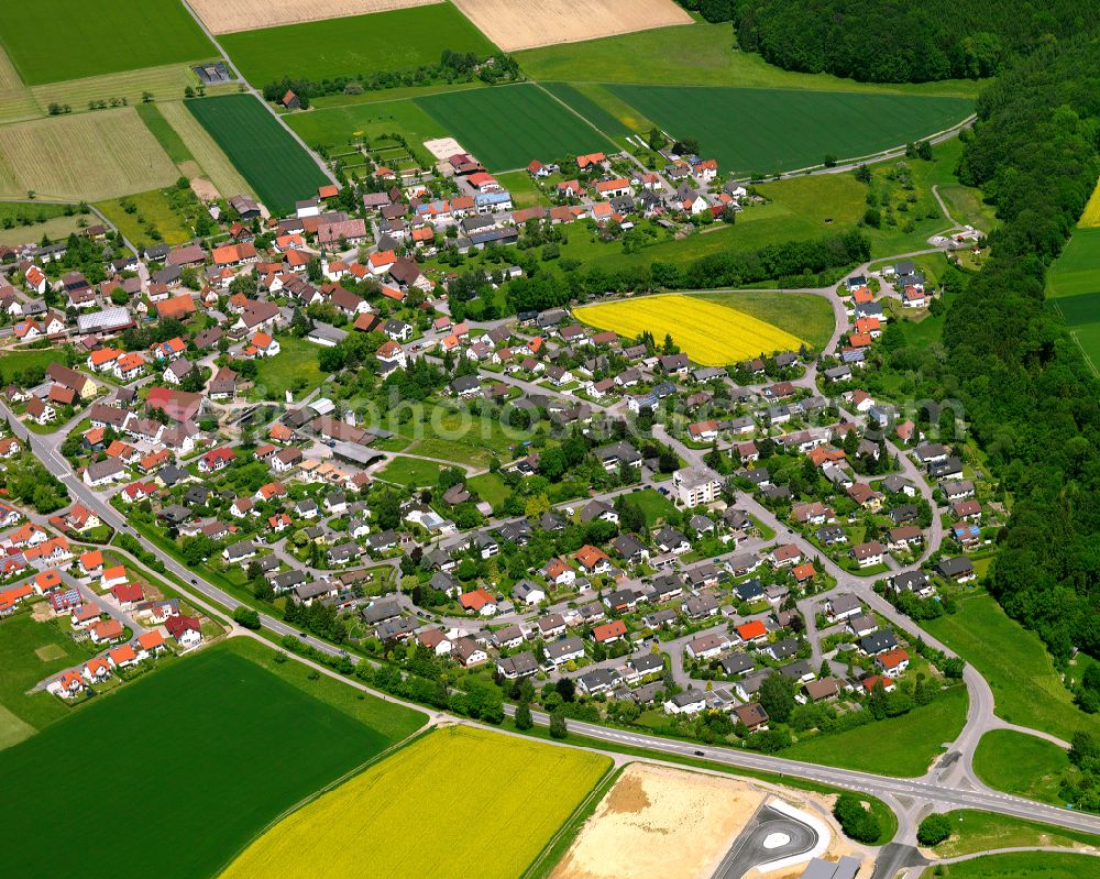 Aerial image Warthausen - Village view on the edge of agricultural fields and land in Warthausen in the state Baden-Wuerttemberg, Germany