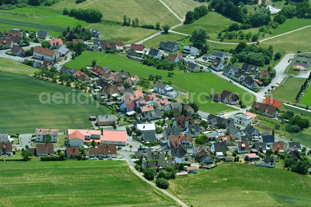 Weilersbach from above - Village view on the edge of agricultural fields and land on street Hohe Rainstrasse in the district Ehrlersheim in Weilersbach in the state Bavaria, Germany