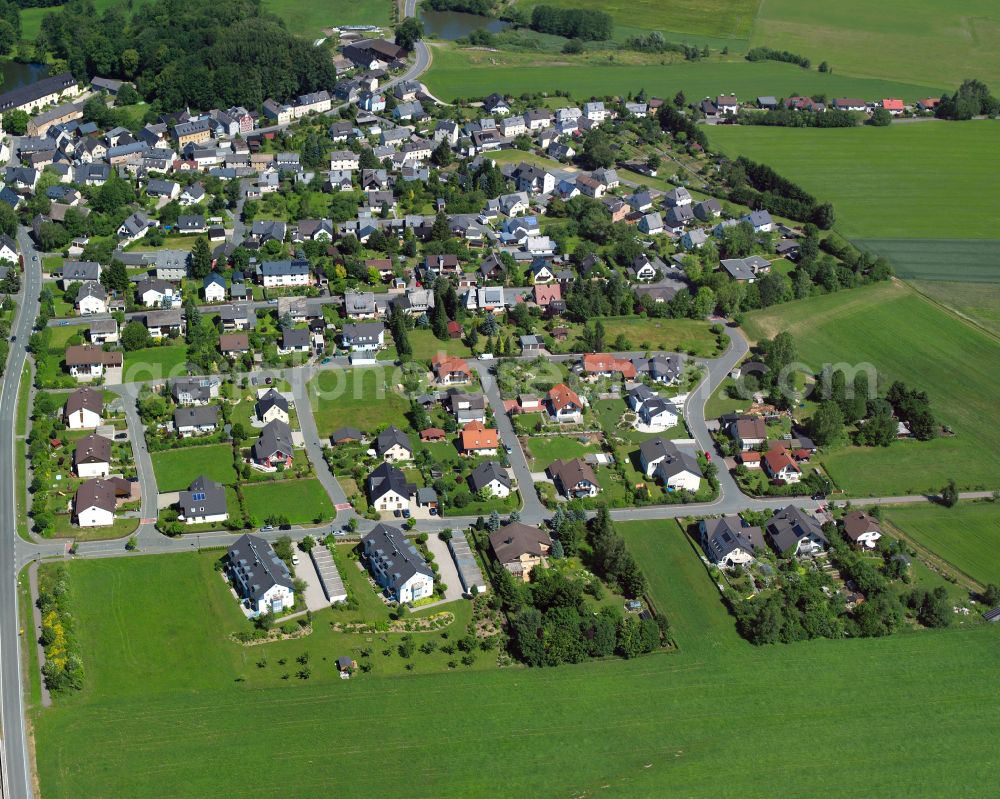 Weißdorf from above - Village view on the edge of agricultural fields and land in Weißdorf in the state Bavaria, Germany