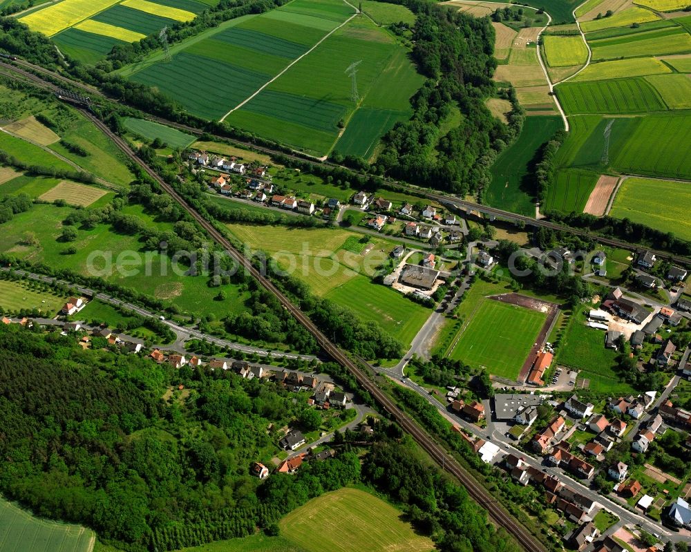 Aerial image Weiterode - Village view on the edge of agricultural fields and land in Weiterode in the state Hesse, Germany