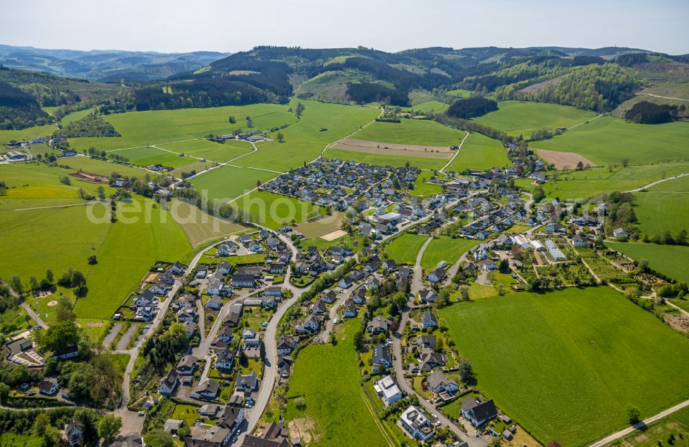 Aerial image Wenholthausen - Village view on the edge of agricultural fields and land in Wenholthausen at Sauerland in the state North Rhine-Westphalia, Germany