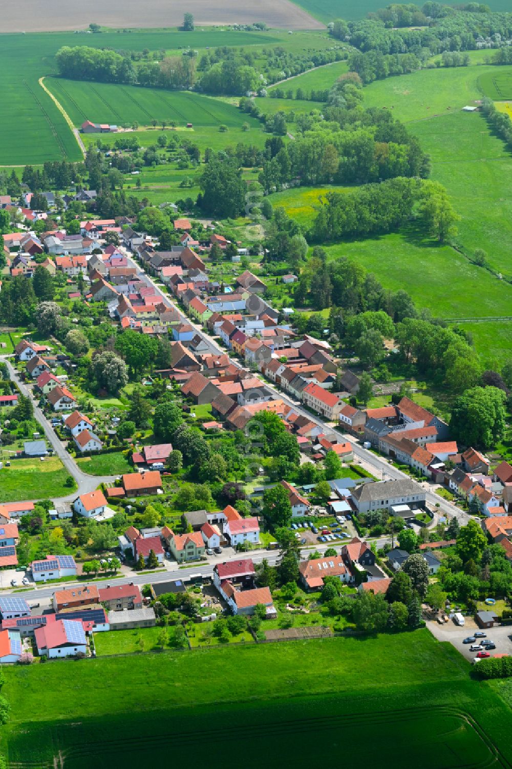 Aerial image Westhausen - Village view on the edge of agricultural fields and land in Westhausen in the state Thuringia, Germany