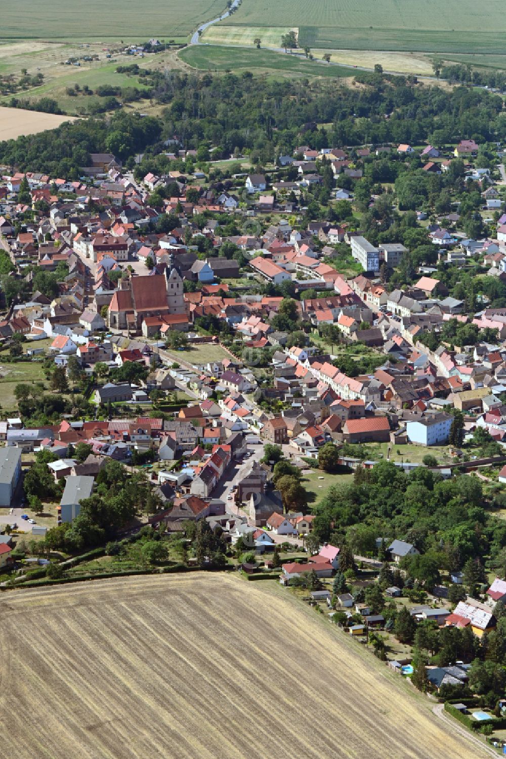 Aerial image Wettin-Löbejün - Village view on the edge of agricultural fields and land in Wettin-Loebejuen in the state Saxony-Anhalt, Germany