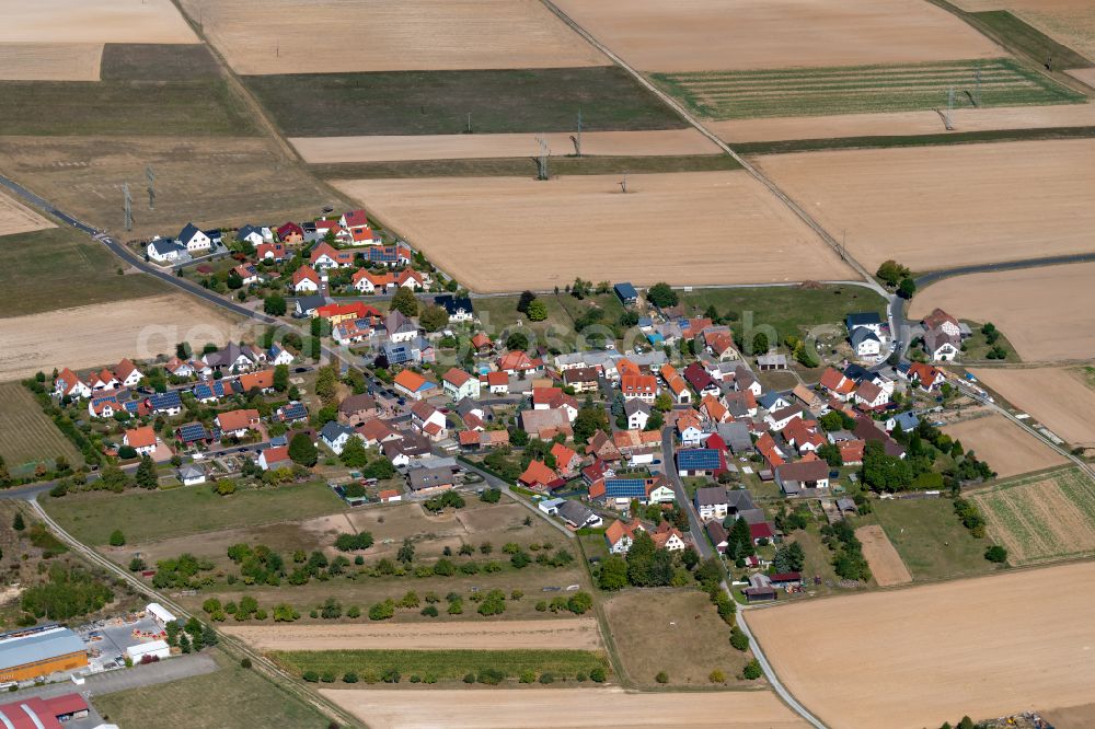 Wiebelbach from the bird's eye view: Village view on the edge of agricultural fields and land in Wiebelbach in the state Bavaria, Germany