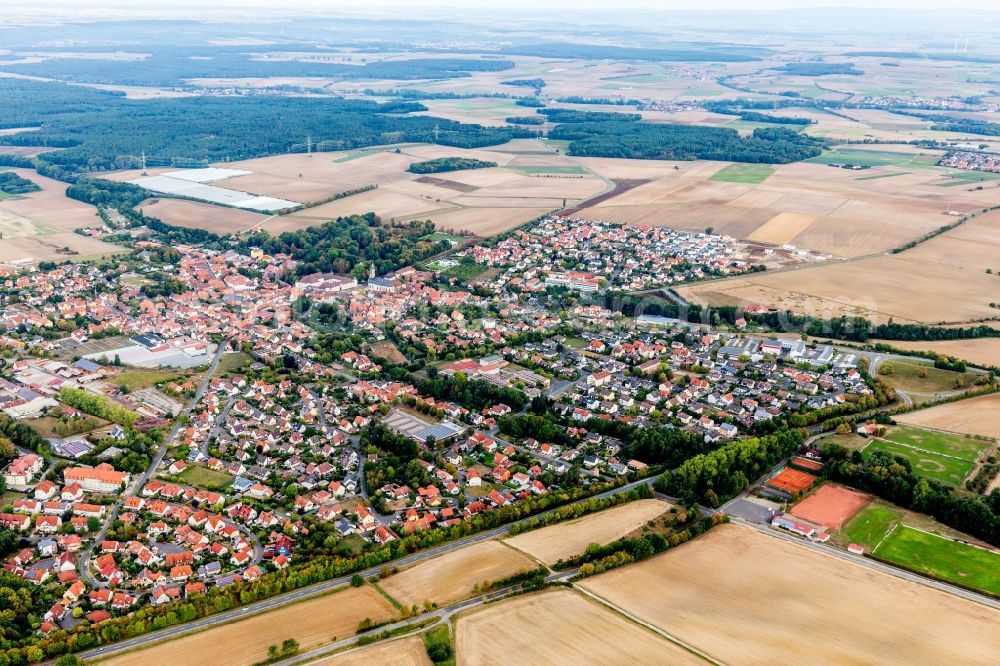 Wiesentheid from the bird's eye view: Village view on the edge of agricultural fields and land in Wiesentheid in the state Bavaria, Germany