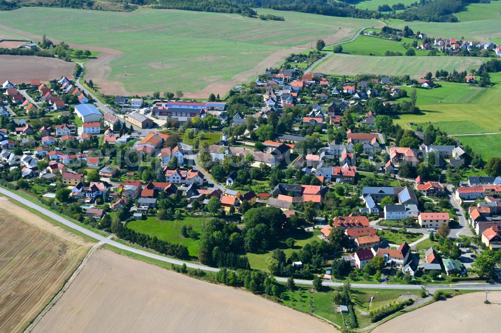 Wildetaube from above - Village view on the edge of agricultural fields and land in Wildetaube in the state Thuringia, Germany