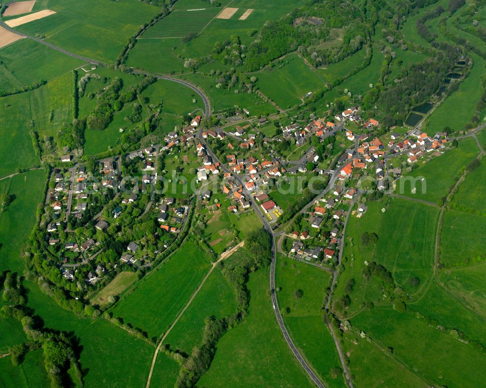 Aerial photograph Wingershausen - Village view on the edge of agricultural fields and land in Wingershausen in the state Hesse, Germany