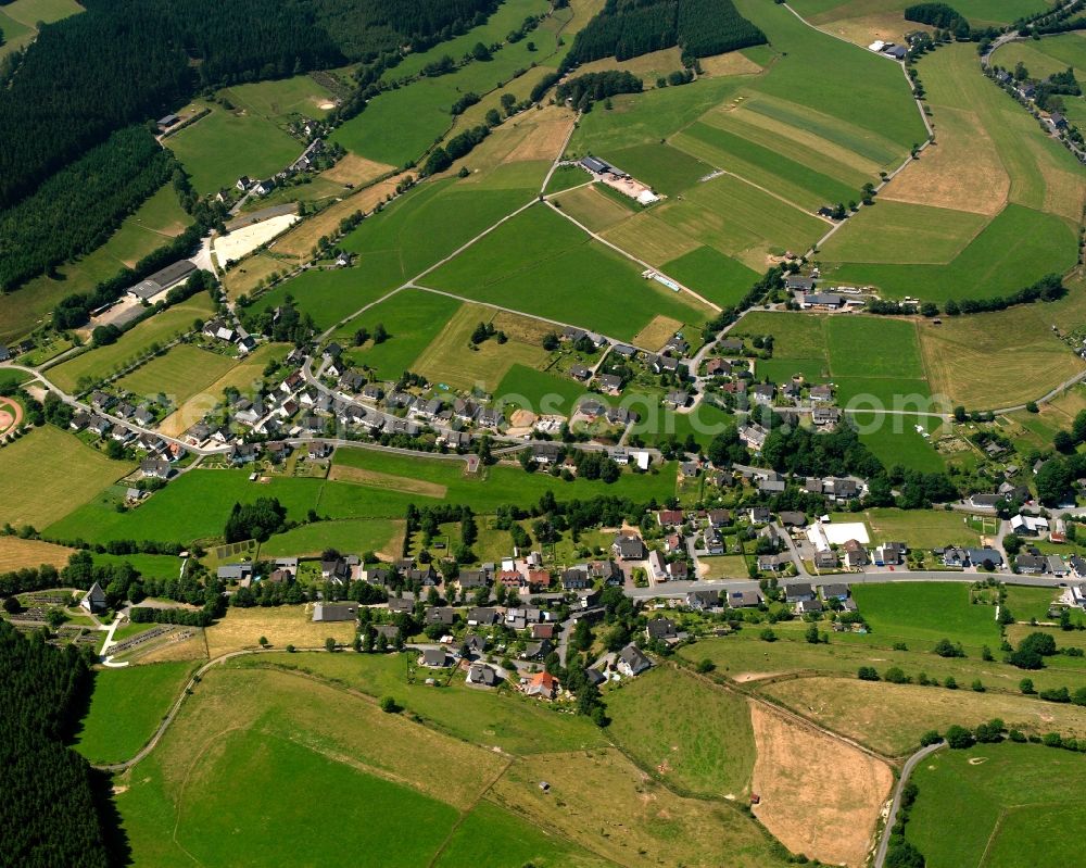 Aerial photograph Wingeshausen - Village view on the edge of agricultural fields and land in Wingeshausen in the state North Rhine-Westphalia, Germany