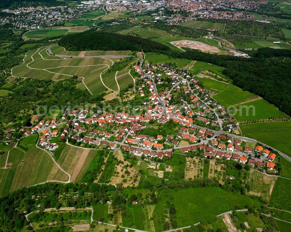 Winnenden from the bird's eye view: Village view on the edge of agricultural fields and land in Winnenden in the state Baden-Wuerttemberg, Germany