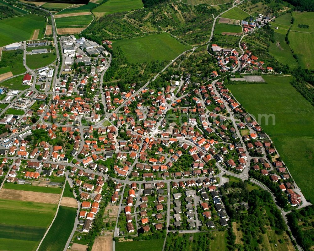 Winnenden from the bird's eye view: Village view on the edge of agricultural fields and land in Winnenden in the state Baden-Wuerttemberg, Germany