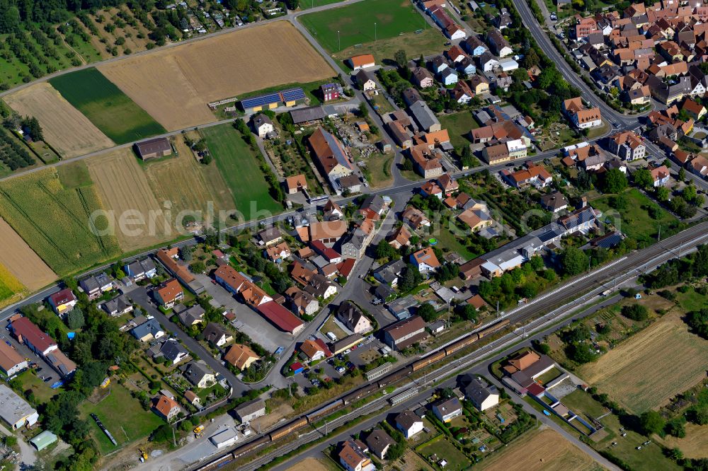 Winterhausen from the bird's eye view: Village view on the edge of agricultural fields and land in Winterhausen in the state Bavaria, Germany