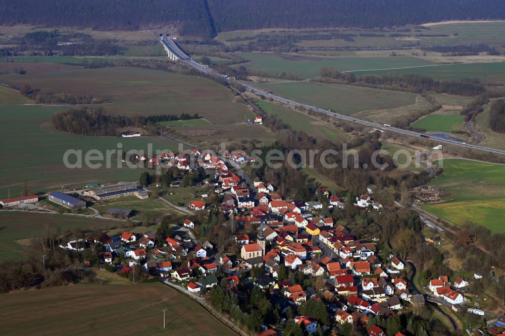 Wölfershausen from above - Village view on the edge of agricultural fields and land in Woelfershausen in the state Thuringia, Germany