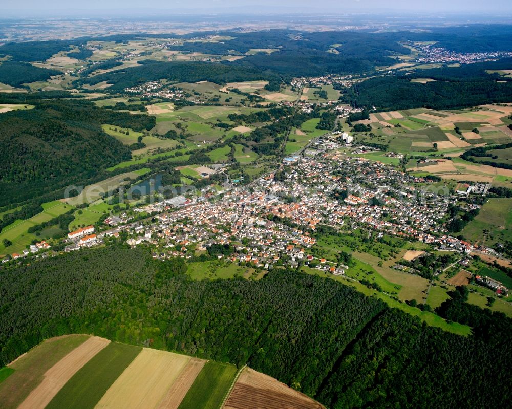 Zell from the bird's eye view: Village view on the edge of agricultural fields and land in Zell in the state Hesse, Germany