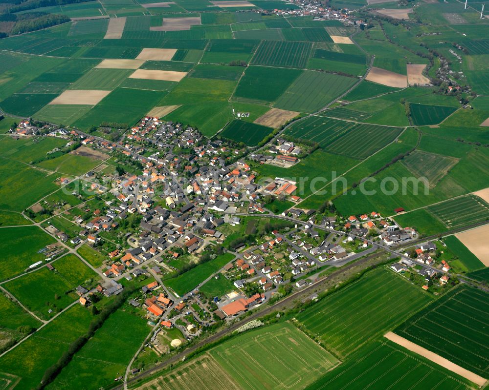 Zell from the bird's eye view: Village view on the edge of agricultural fields and land in Zell in the state Hesse, Germany