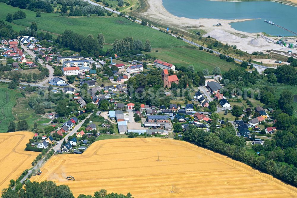 Aerial photograph Zurow - Village view on the edge of agricultural fields and land in Zurow in the state Mecklenburg - Western Pomerania, Germany