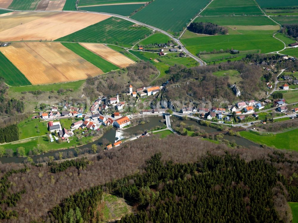 Aerial photograph Rechtenstein - The village of Rechtenstein in the state of Baden-Wuerttemberg. Rechtenstein is located on the Danube and is home to the baroque parochial church of St. George, the tower and remains of a former castle as well as the hydro power station from 1905. A wooded hill is located on the other riverbank