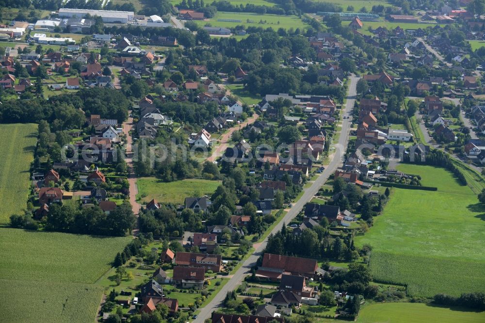 Rehburg-Loccum from the bird's eye view: View of Rehburg in the state of Lower Saxony. Rehburg is part of the town of Rehburg-Loccum. The residential village consists of single family houses and residential areas. View from the West along Duesselburger Strasse