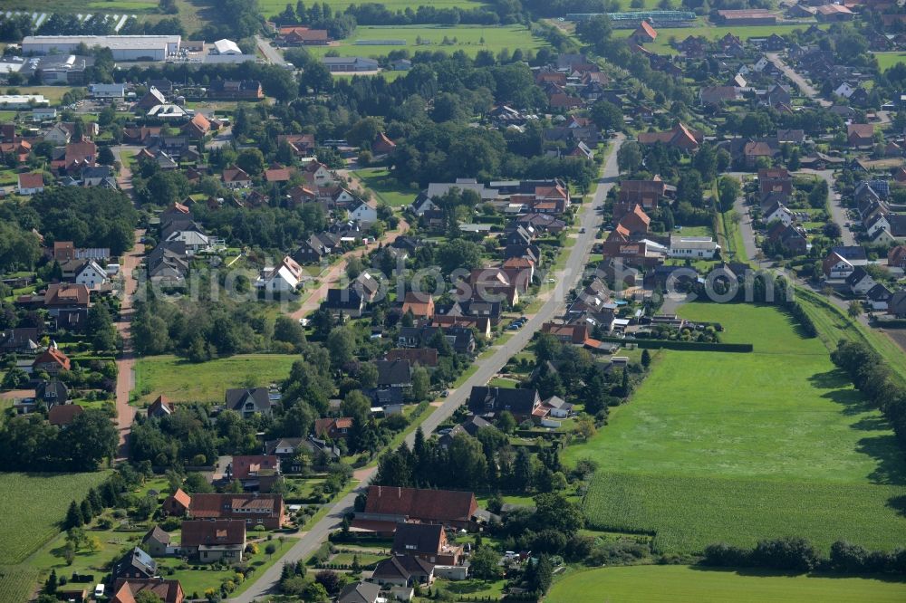 Aerial image Rehburg-Loccum - View of Rehburg in the state of Lower Saxony. Rehburg is part of the town of Rehburg-Loccum. The residential village consists of single family houses and residential areas. View from the West along Duesselburger Strasse