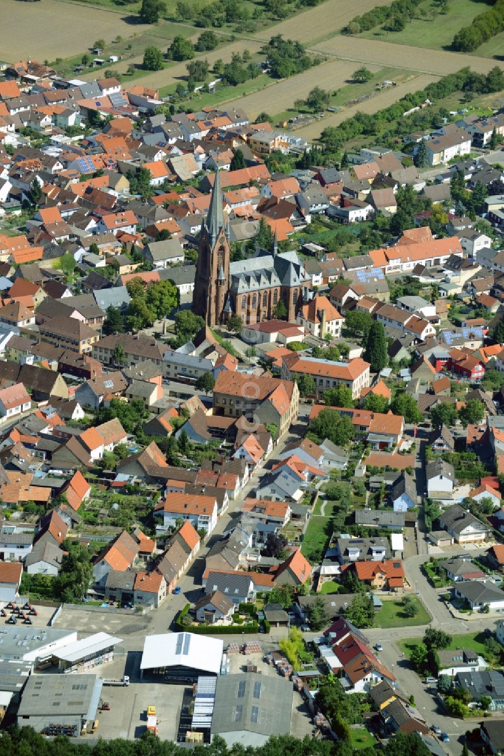 Philippsburg from above - Town View of the streets and houses of the residential areas in Rheinsheim in the state Baden-Wuerttemberg