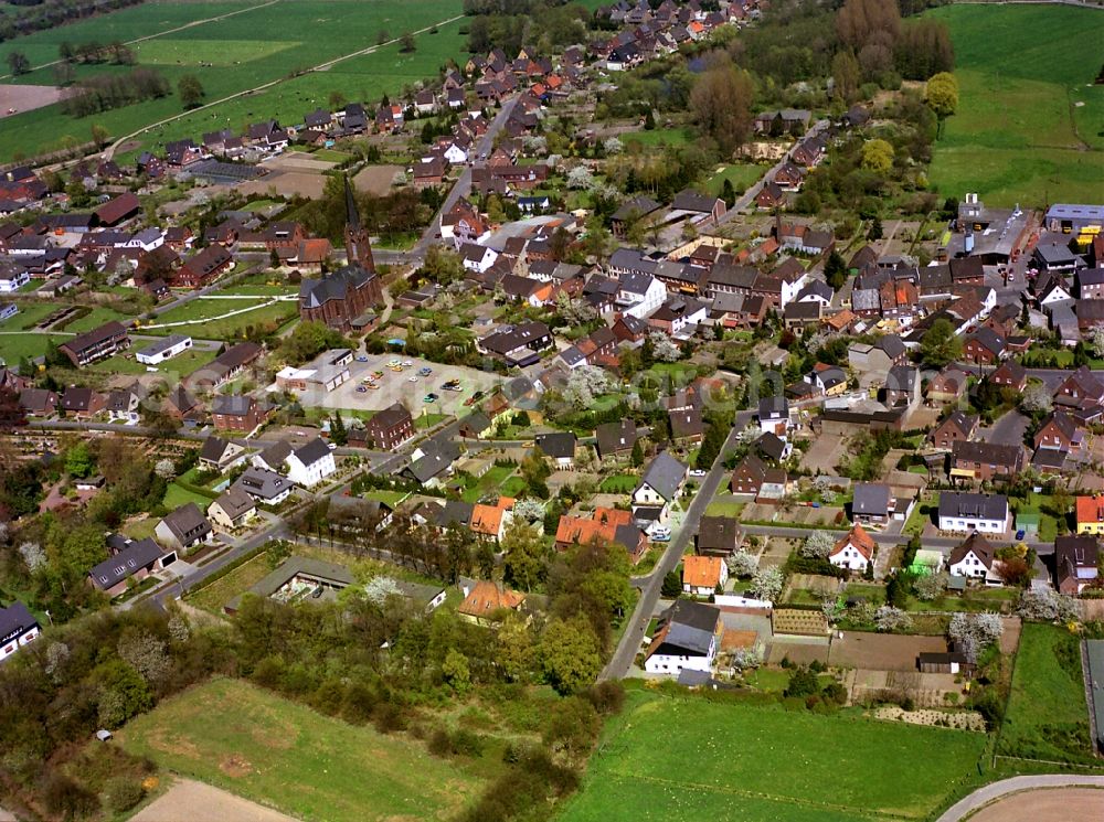 Aerial image Rheurdt - Town View of the streets and houses of the residential areas in Rheurdt in the state North Rhine-Westphalia