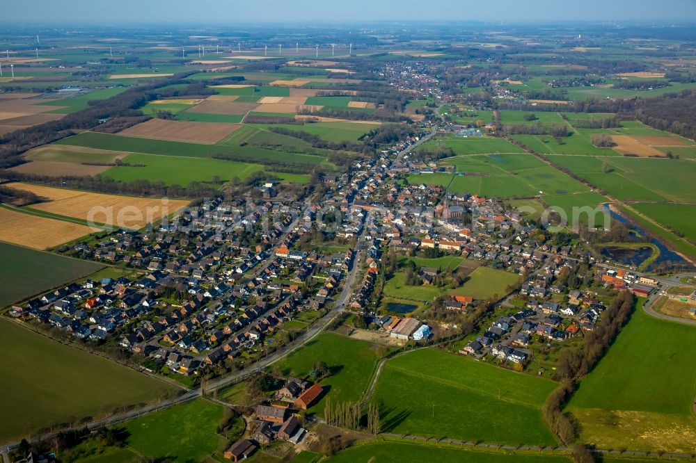 Rheurdt from the bird's eye view: Town View of the streets and houses of the residential areas in Rheurdt in the state North Rhine-Westphalia