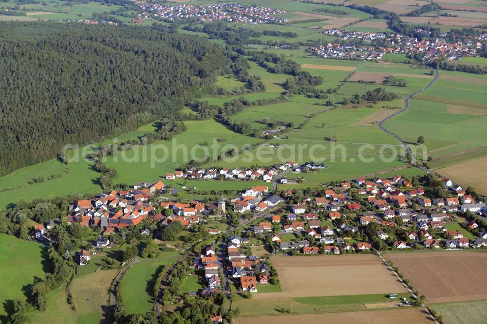 Ebersburg from the bird's eye view: Town View of the streets and houses of the residential areas in Ried in the state Hesse