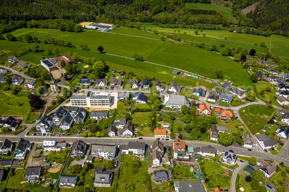 Aerial image Langscheid - Town View of the streets and houses of the residential areas in Langscheid at Sauerland in the state North Rhine-Westphalia, Germany