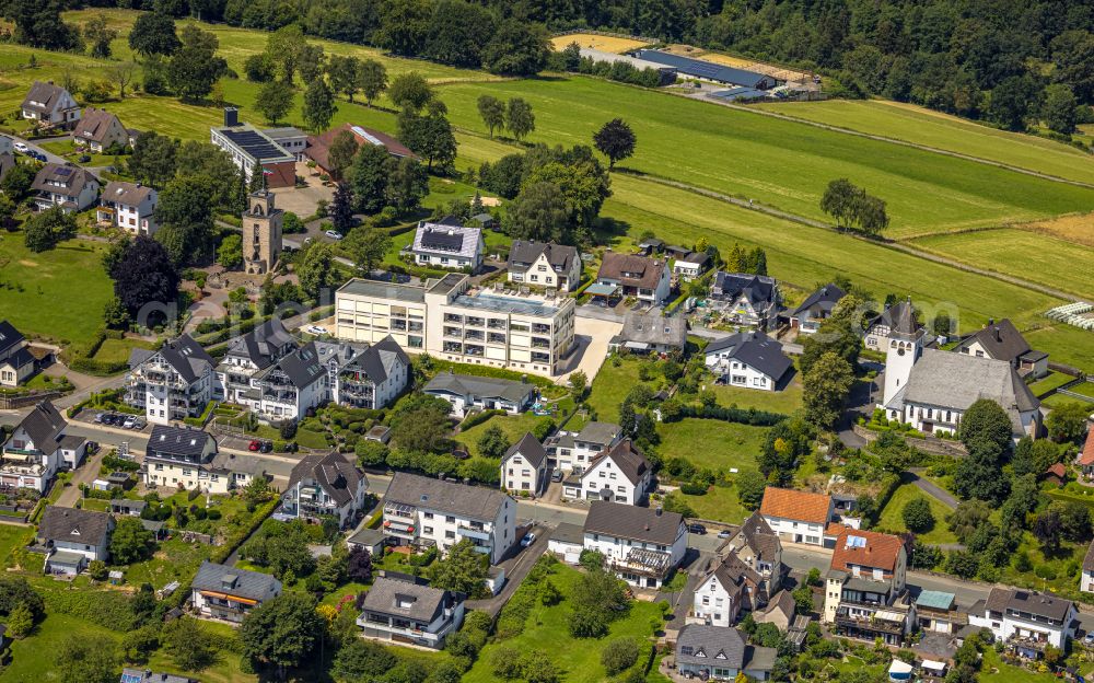 Langscheid from the bird's eye view: Town View of the streets and houses of the residential areas in Langscheid at Sauerland in the state North Rhine-Westphalia, Germany