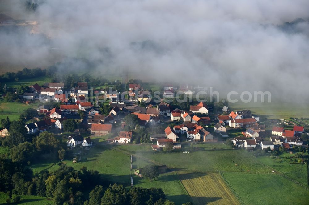 Rörshain from the bird's eye view: Town View of the streets and houses of the residential areas in Roershain in the state Hesse, Germany