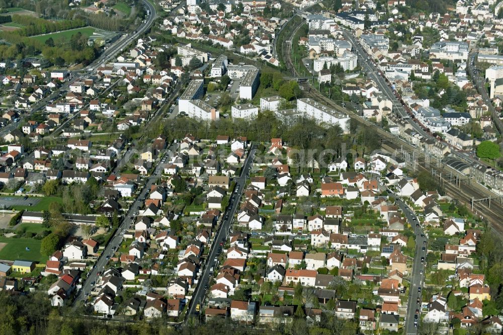 Aerial image Saint-Cyr-l'Ecole - Town View of the streets and houses of the residential areas in Saint-Cyr-l'Ecole in Ile-de-France, France