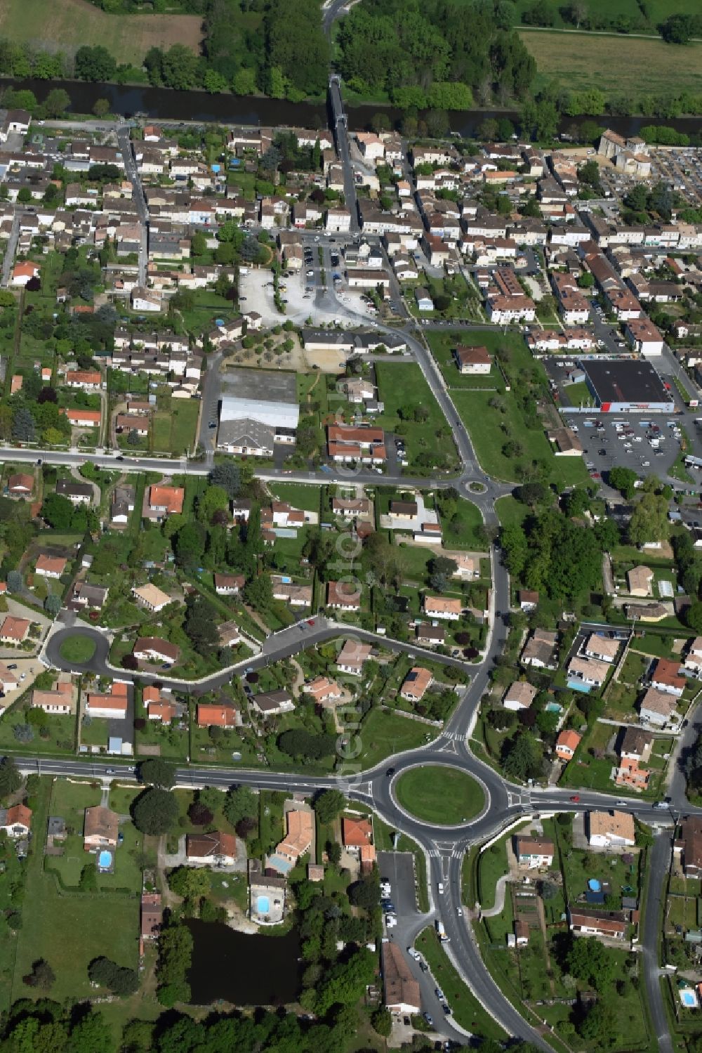 Aerial image Saint-Denis-de-Pile - Town View of the streets and houses of the residential areas in Saint-Denis-de-Pile in Aquitaine Limousin Poitou-Charentes, France