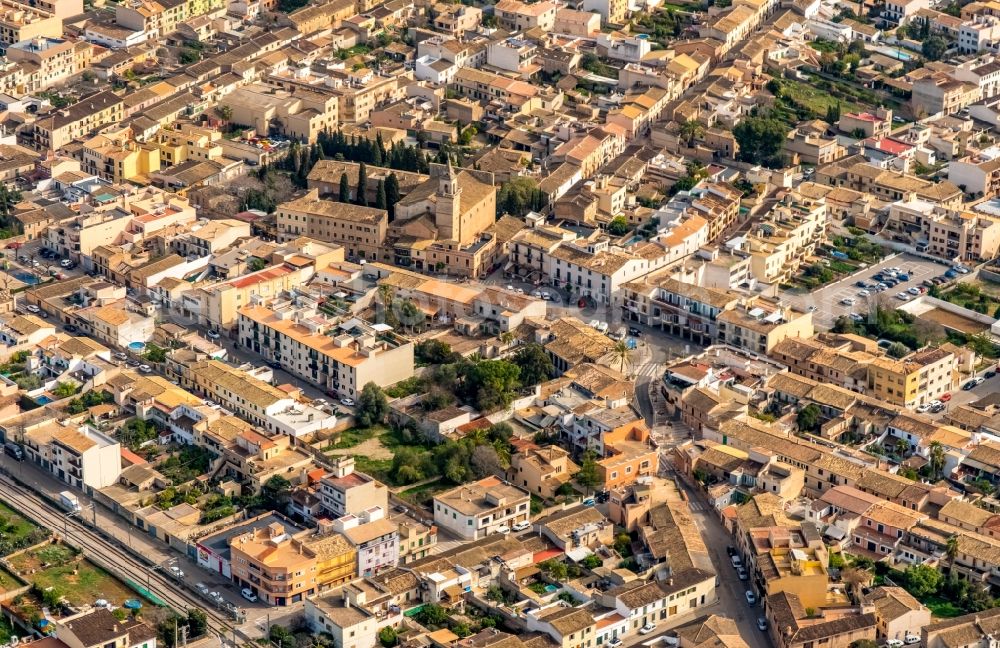 Santa Maria del Camino from above - District view of the streets and houses of the residential areas with Esglesia de la Mare de Deu de la Soledat church in Santa Maria del Camino in Islas Baleares, Spain