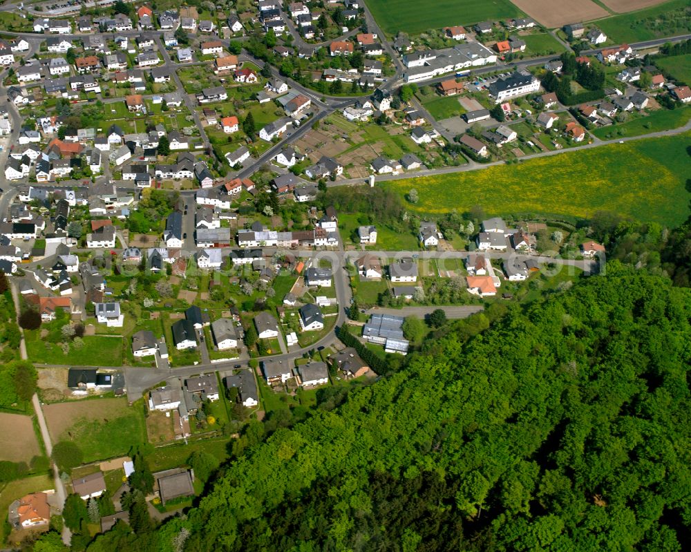 Schönbach from above - Town View of the streets and houses of the residential areas in Schönbach in the state Hesse, Germany