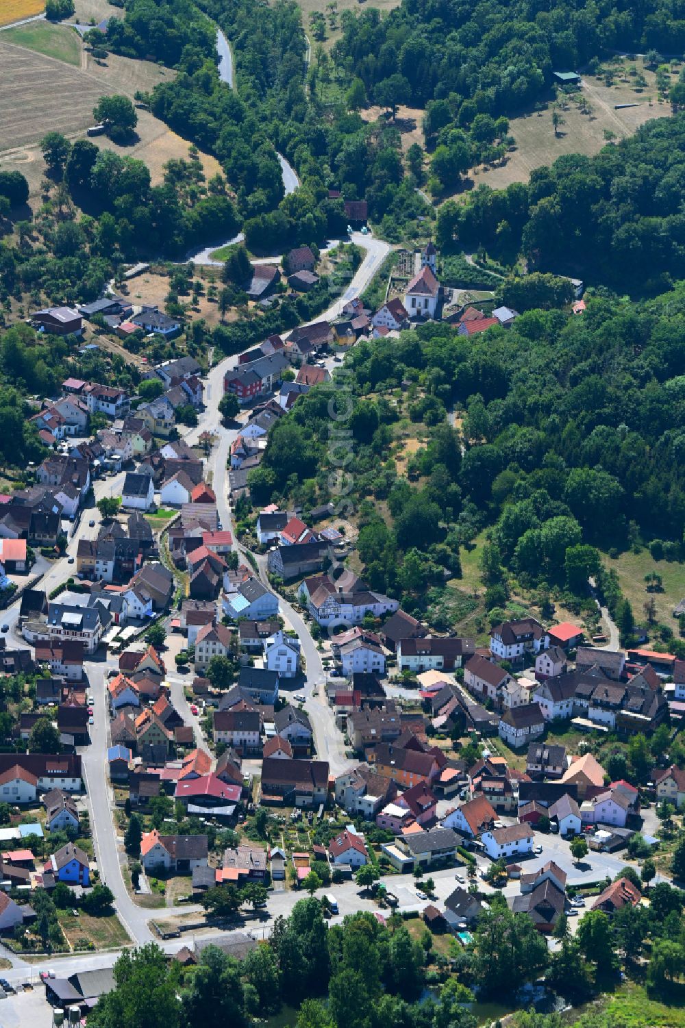 Schöntal from above - Town View of the streets and houses of the residential areas on street Obere Hauptstrasse in the district Westernhausen in Schoental in the state Baden-Wuerttemberg, Germany