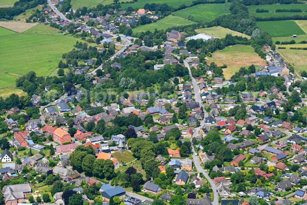 Aerial photograph Schwabstedt - Town View of the streets and houses of the residential areas in Schwabstedt in the state Schleswig-Holstein, Germany