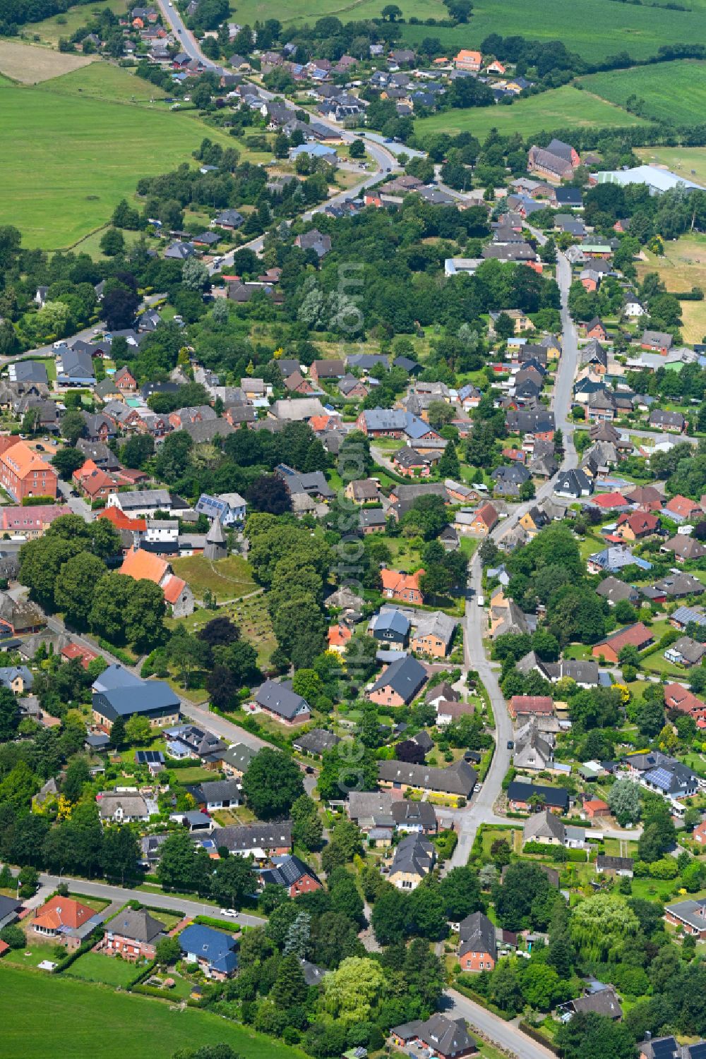 Schwabstedt from the bird's eye view: Town View of the streets and houses of the residential areas in Schwabstedt in the state Schleswig-Holstein, Germany