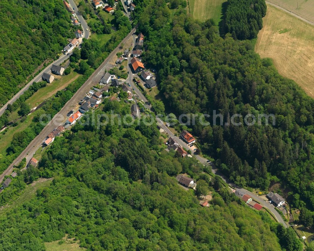 Aerial photograph Heimbach - View of the South of Heimbach in the state of Rhineland-Palatinate. Heimbach is a borough and municipiality in the county district of Birkenfeld. The village is surrounded by hills, fields and vineyards and consists of several hamlets and residential areas. It sits in the valley of the river Nahe. The street In der Ihlsbach is located in a narrow valley in the South of the village