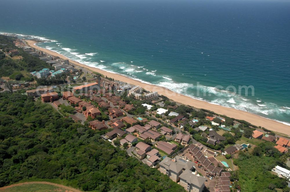 Aerial image SHELLY BEACH - Townscape of Shelly Beach in South Africa, a seaside resort south of Port Shepstone with a lot of hotels and holiday homes